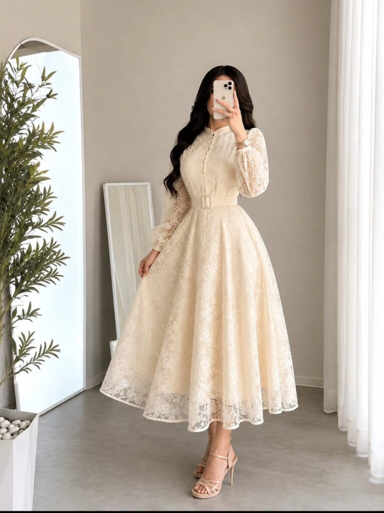 Woman in a vintage cream lace wedding dress with a full tea-length skirt